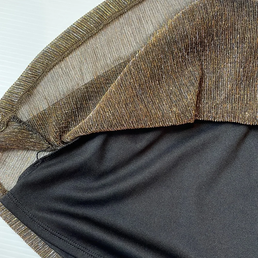Old Navy gold and black short skirt.  Girl’s size 8